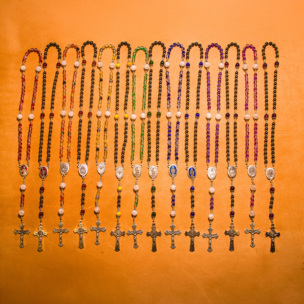 All 14 handmade 7 Deadly Dragons rosaries, one for each book in glass and hematite styles